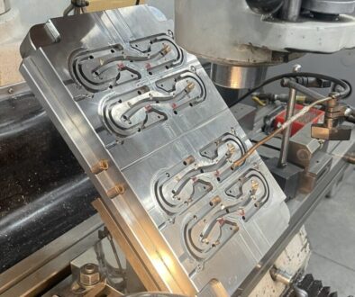 Metal block cavity plate for injection molding-hot runners